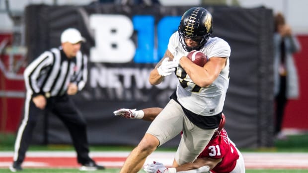 Purdue's Payne Durham (87) is tackled by Indiana's Bryant Fitzgerald (31) during the second half of the Indiana versus Purdue football game at Memorial Stadium on Saturday, Nov. 26, 2022.